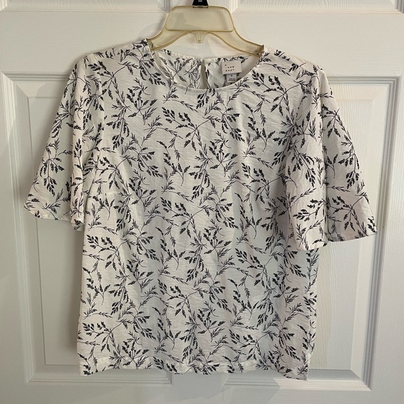 A New Day size small. White background with black print. - Picture 2 of 3